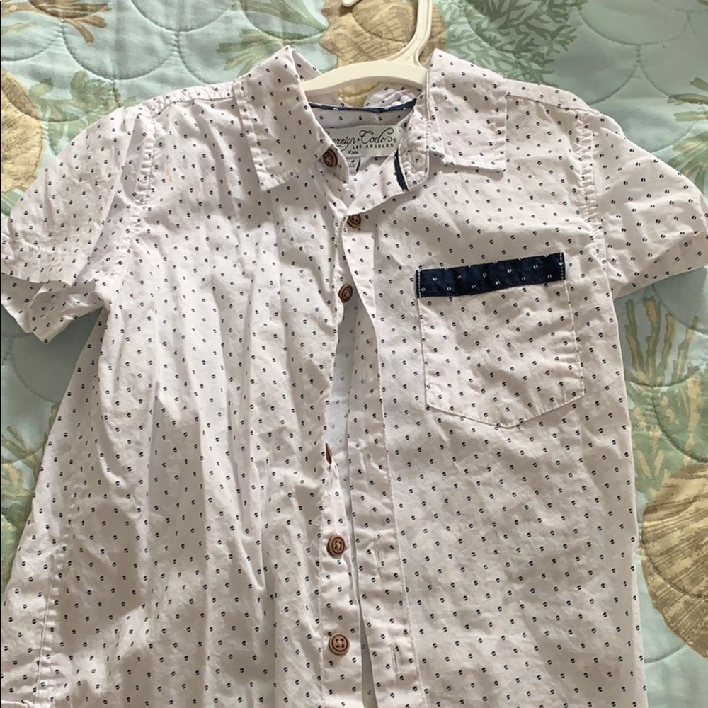 White and blue dotted button up